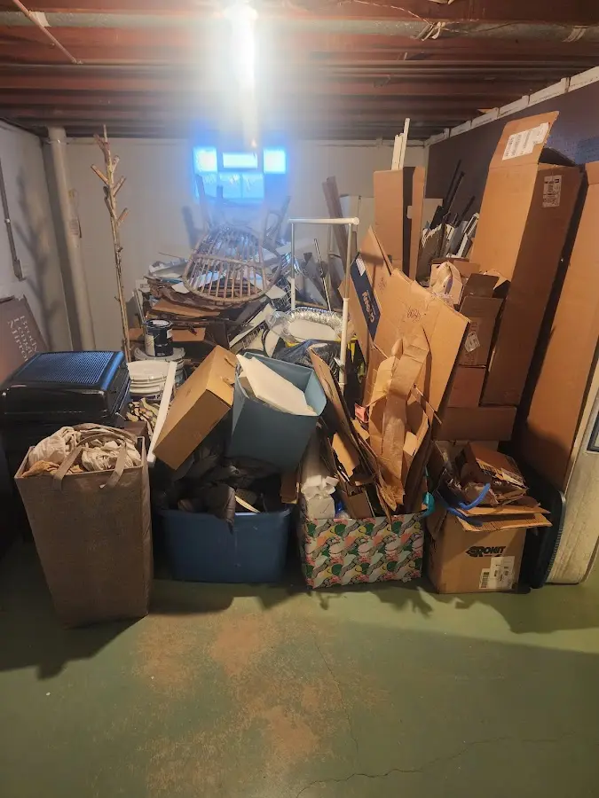 Roll-off dumpster container at job site for Construction Dumpster Rental in Mechanic Falls